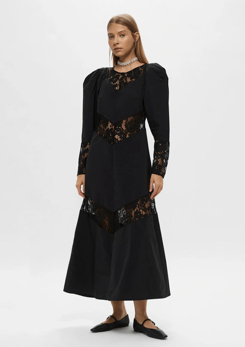 Kleid mit Puffärmeln und Spitze