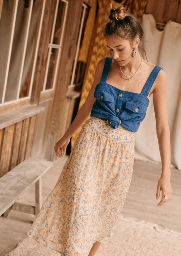 JUPE MIDI JAUNE À FLEURS