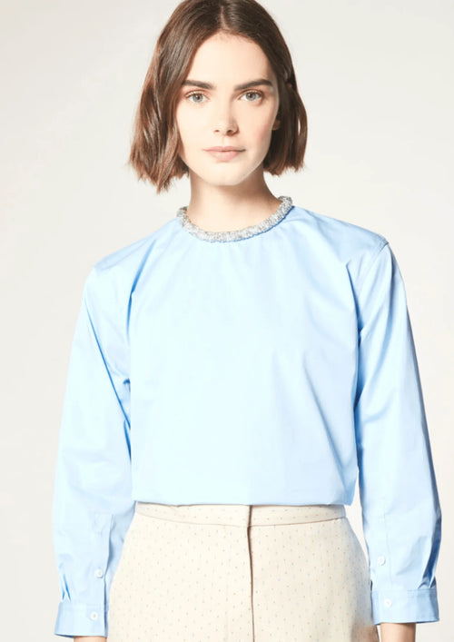 LIGHT BLUE TOP WITH DECORATIVE PEARLS