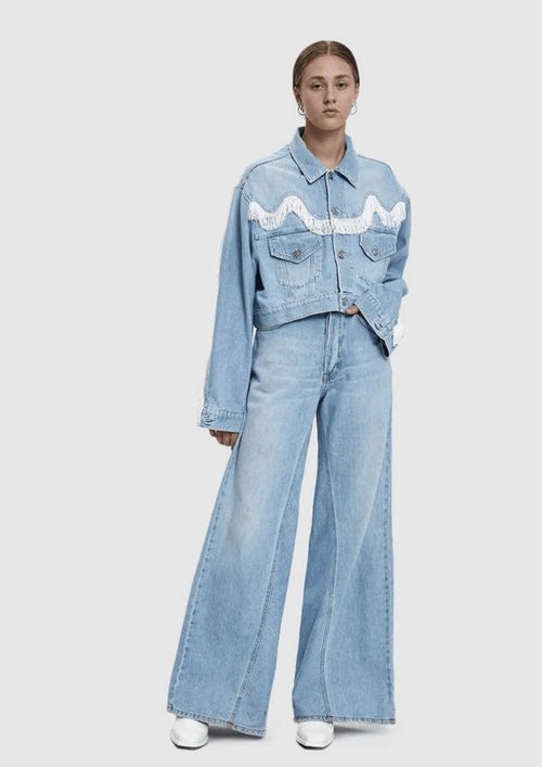 Veste en jean à franges recadrée