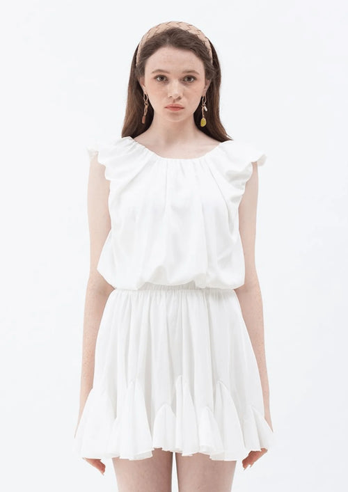 WEISSER MINIROCK MIT RÜSCHEN