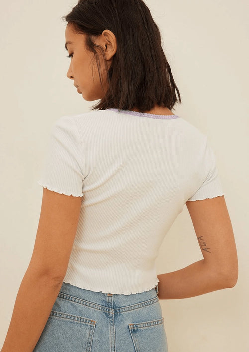 T-SHIRT BLANC EN MATIÈRE BIOLOGIQUE AVEC DÉTAILS BABYLOCK