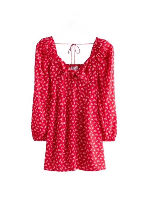 MINI-ROBE AVEC DÉTAIL DE NŒUD ROUGE