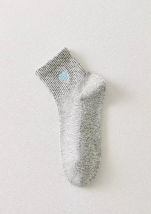 Chaussettes longues à cœur blanc et rouge