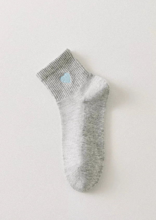 Chaussettes longues à cœur blanc et rouge