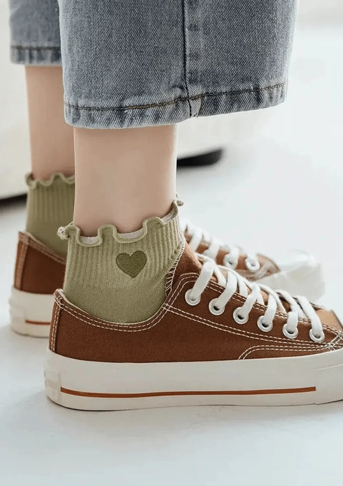 Chaussettes de détail à cœur à volants