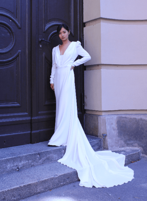 Langarmes weißes Hochzeitskleid